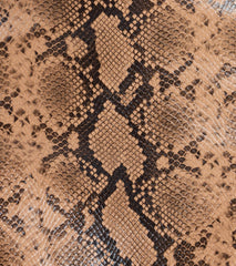 Certified Charmer High Rise Snake Mini Skirt