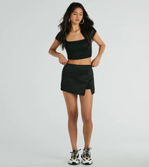 Significant Strut Mid-Rise Bow Slit Skort