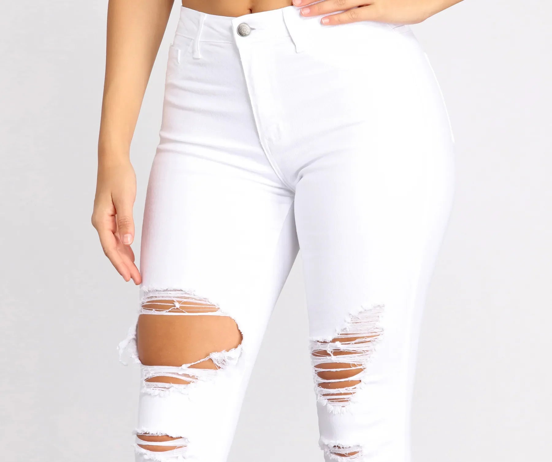 High Rise Destructed Denim Skinny Jeans