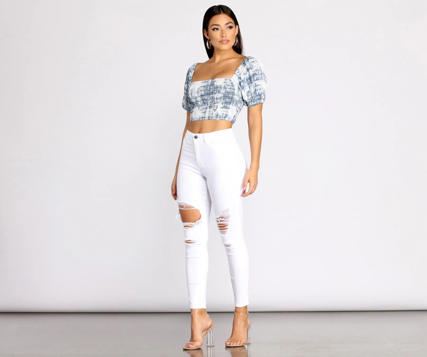 High Rise Destructed Denim Skinny Jeans