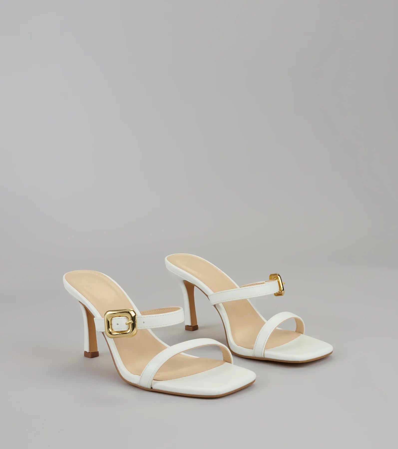 Booked and Buckled Mule Heels