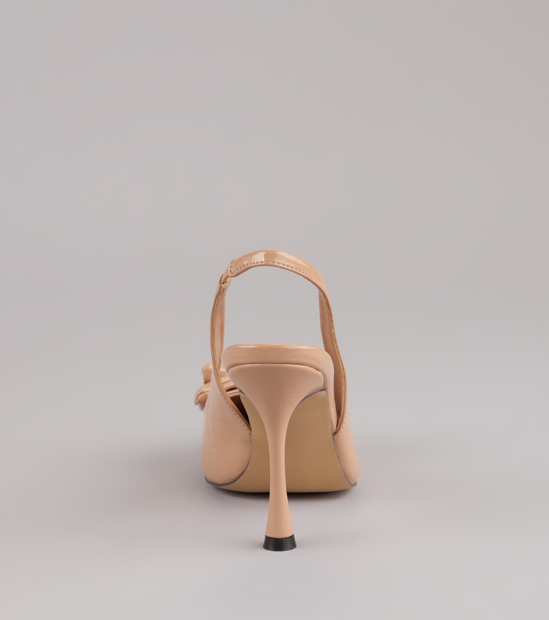 Strut Season Bow Stiletto Pumps