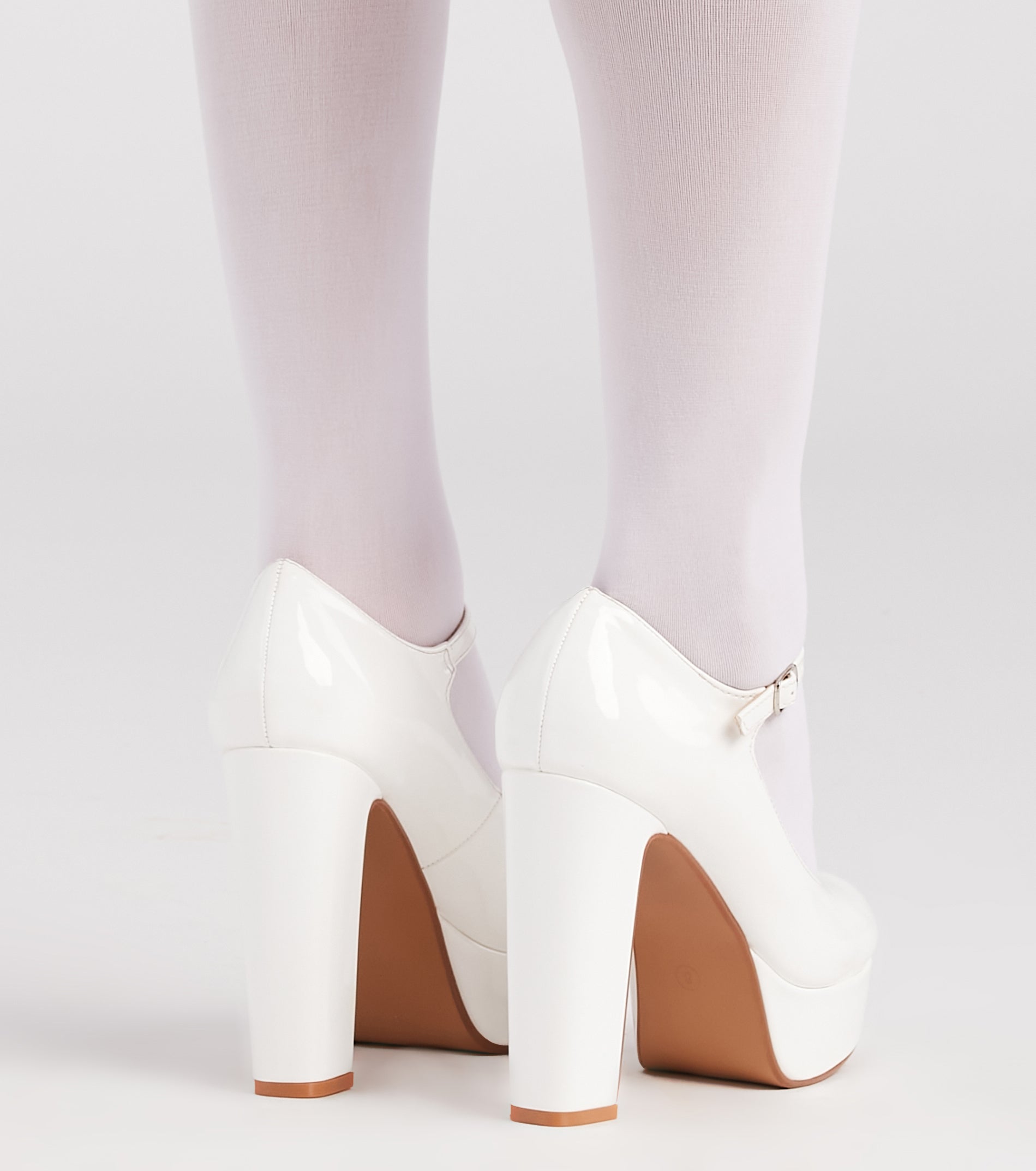 Bold And Polished Patent Leather Platform Pumps